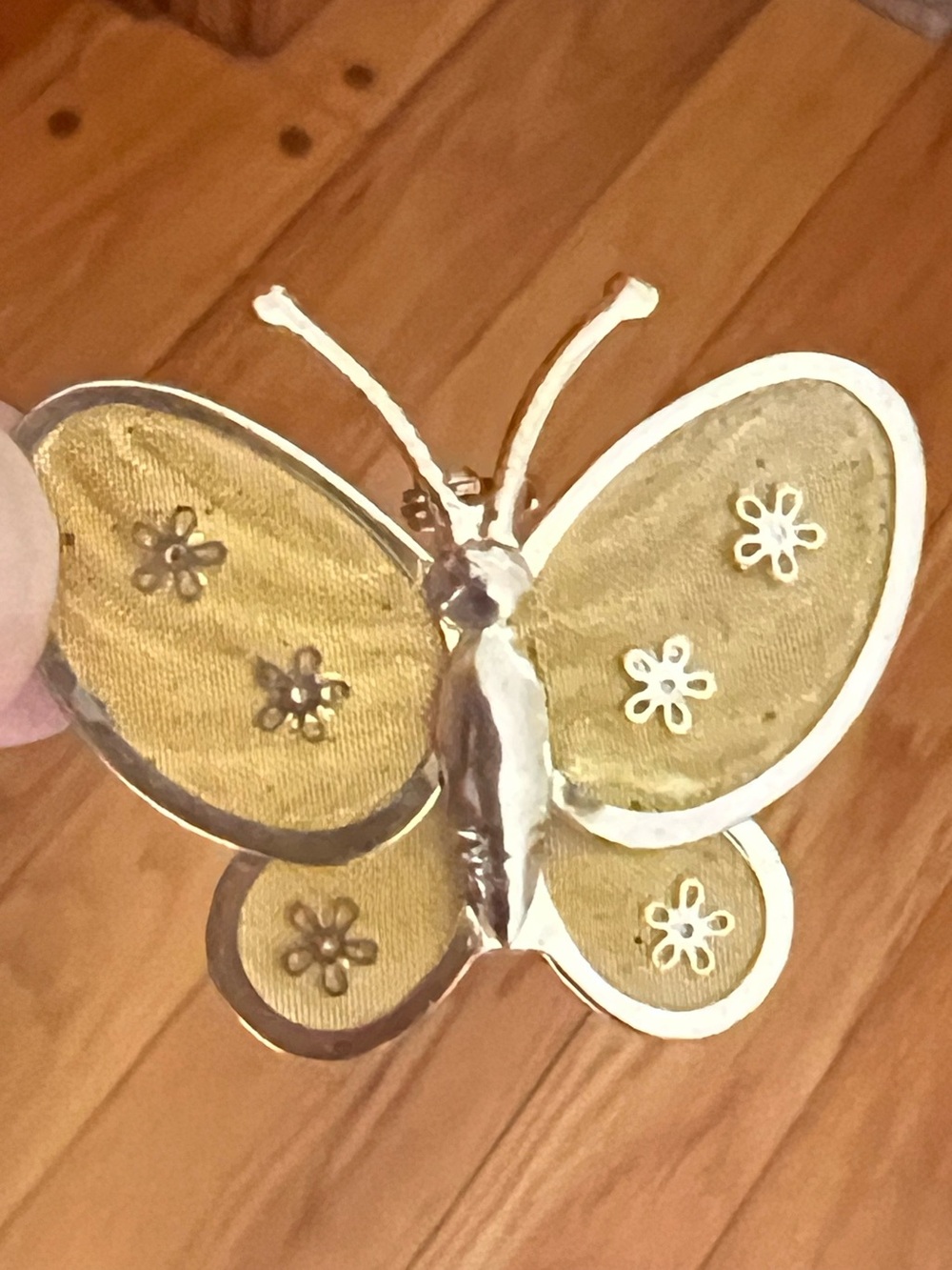 Polished gold and gold mesh. Butterfly pin brooch marked